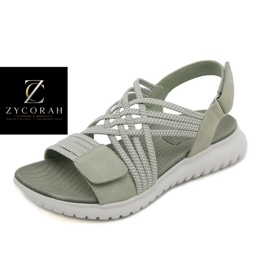 A women's platform sandal by ZYCORAH in sage green and white, featuring woven rope-style crisscross straps and a thick white platform sole, shown on a white background with the brand logo in the top-left corner.