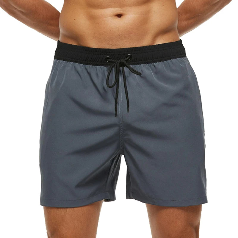Escatch men’s quick dry swim trunks with zipper pockets and mesh lining in stylish beachwear design gray black