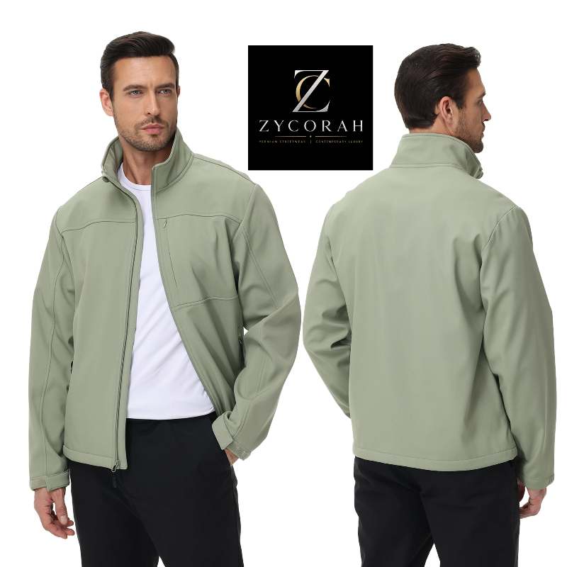A man modeling a light sage green zip-up jacket, shown from both the front and back views against a white background, with a brand logo for ZYCORAH in the upper right.