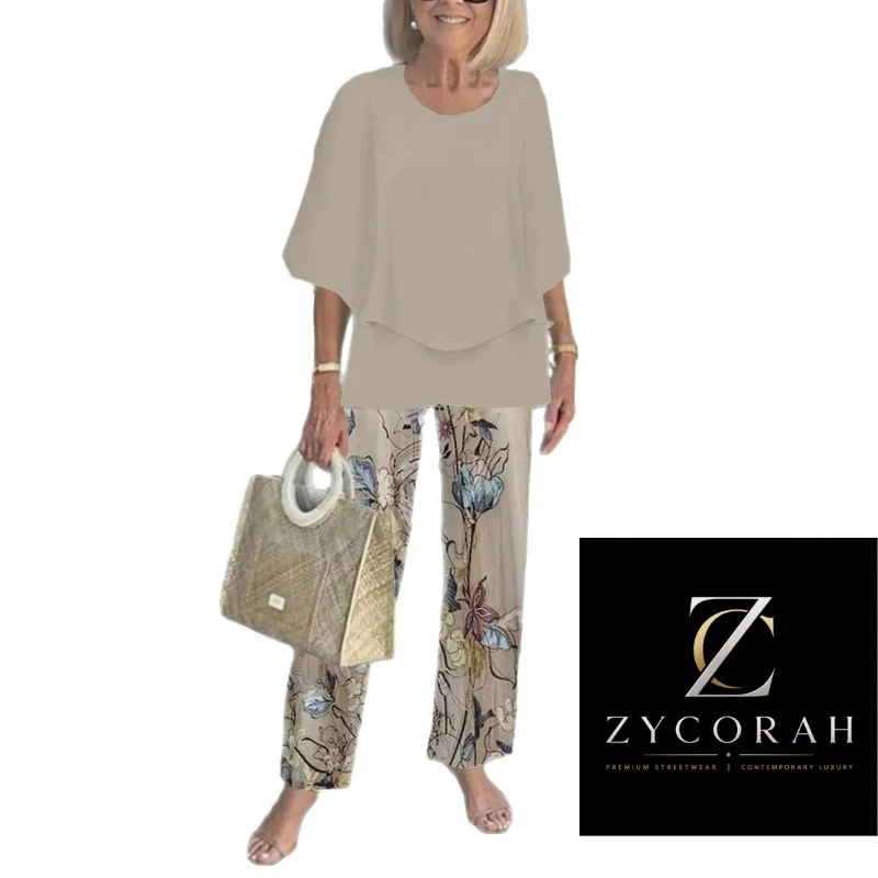 A woman modeling a two-piece lounge set consisting of a loose beige short-sleeve top and matching patterned pants, holding a quilted handbag. A Zycorah brand logo is shown in a black box on the bottom right.