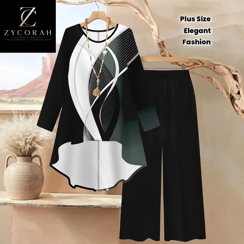 A women's two-piece outfit set featuring a black, white, and gray abstract print long-sleeve tunic top on a hanger, paired with solid black wide-leg pants. The set is displayed against a warm desert-themed backdrop with a wooden branch prop and a ceramic vase, with branding text 'ZYCORAH' and 'Plus Size Elegant Fashion' overlays.