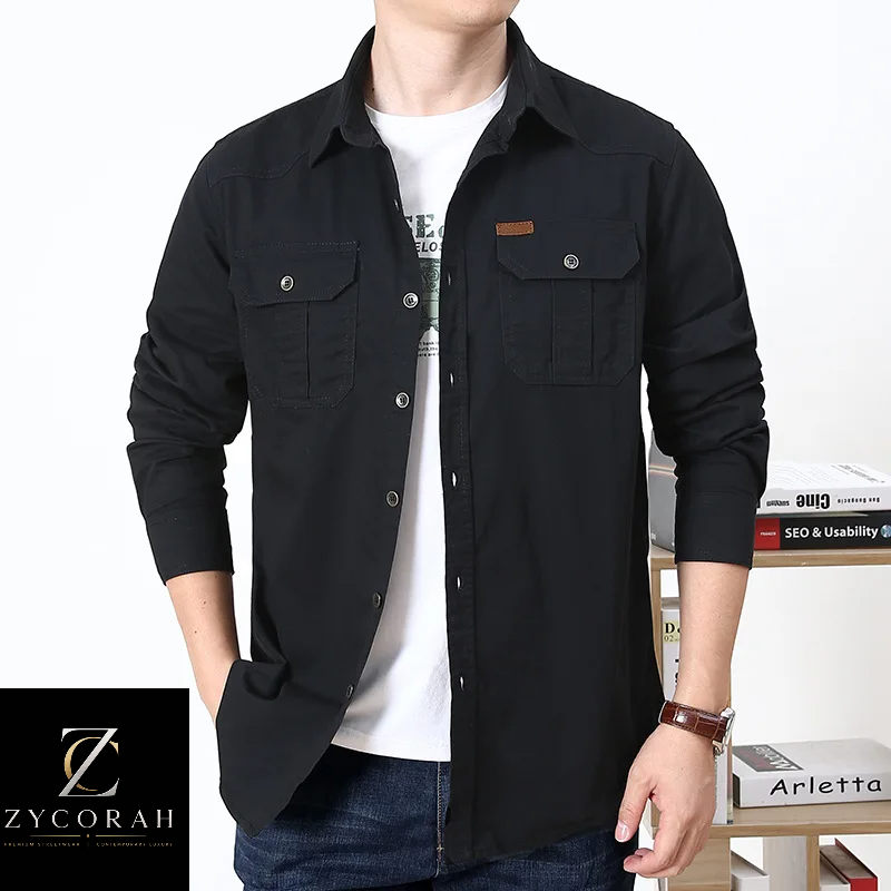 A man wearing a black long-sleeve western-style button-up shirt over a white graphic t-shirt and blue jeans, with a Zycorah brand logo overlay in the bottom left corner.