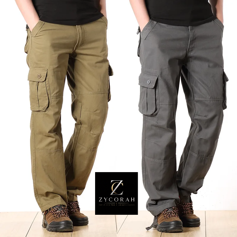 Two models wearing ZYCORAH cargo pants, one in olive green and one in dark gray, standing side-by-side against a white background with a brand logo overlay at the bottom.