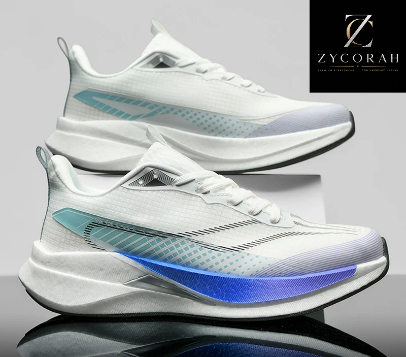 A pair of white athletic sneakers with light blue and purple gradient accents, displayed on a reflective surface with a brand logo in the top right corner.