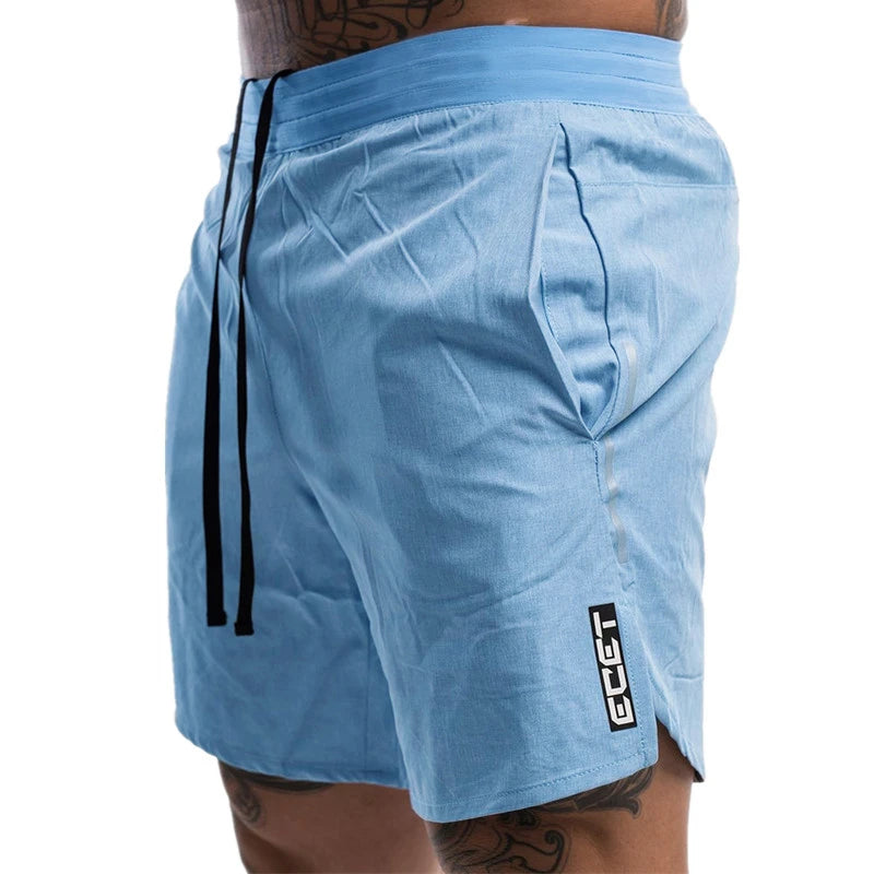 Blue athletic shorts with a brand logo on a white background