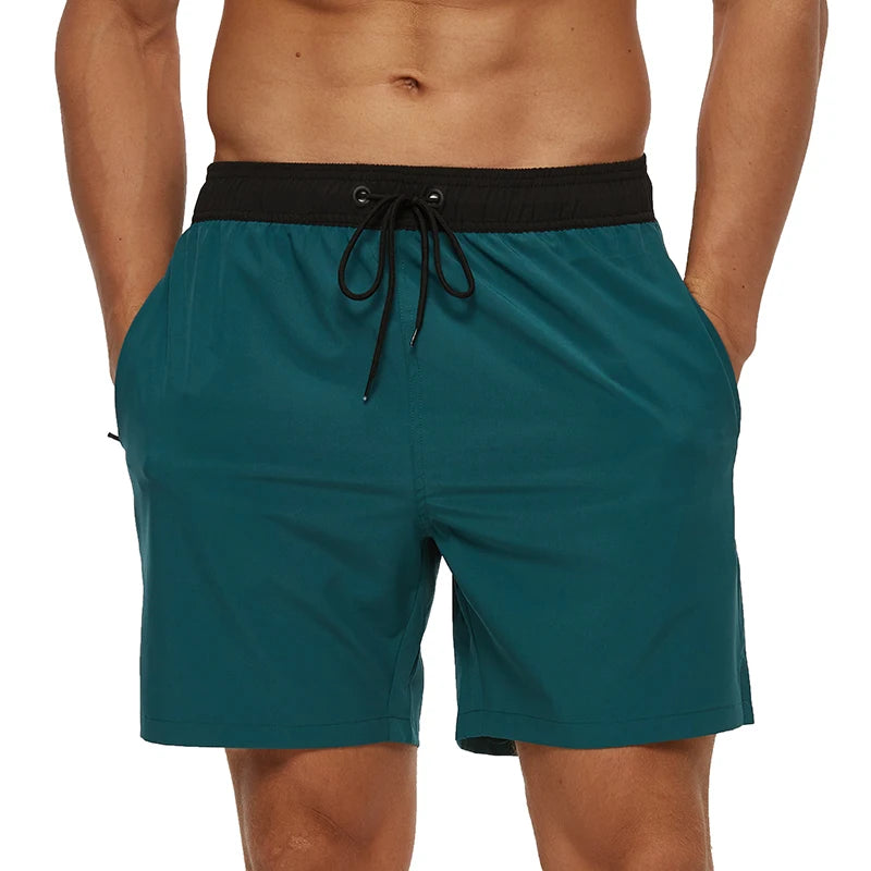 Escatch men’s quick dry swim trunks with zipper pockets and mesh lining in stylish beachwear design green black