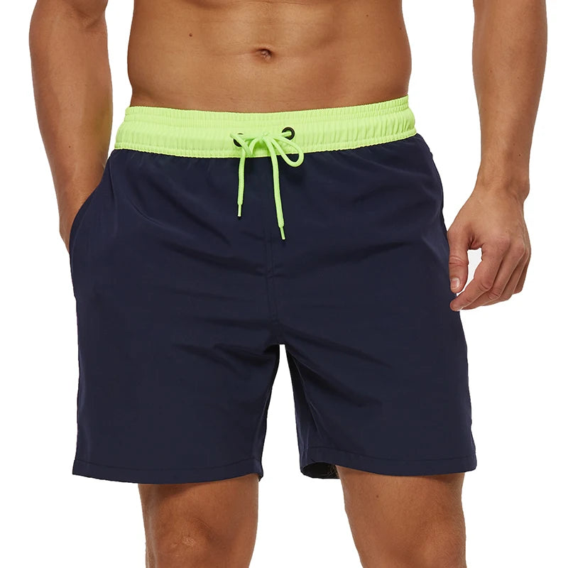 Escatch men’s quick dry swim trunks with zipper pockets and mesh lining in stylish beachwear design blue green