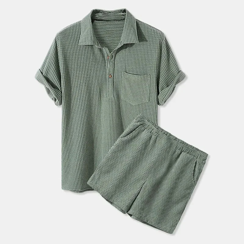 Green checkered shirt and shorts set on a white background