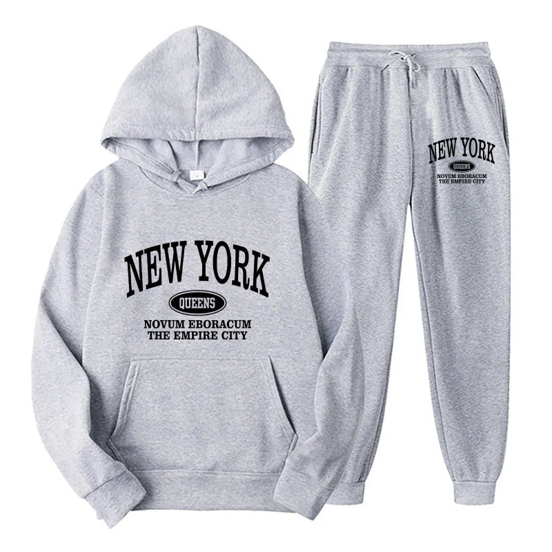 Gray hoodie and jogger pants set with 'New York' text on a white background