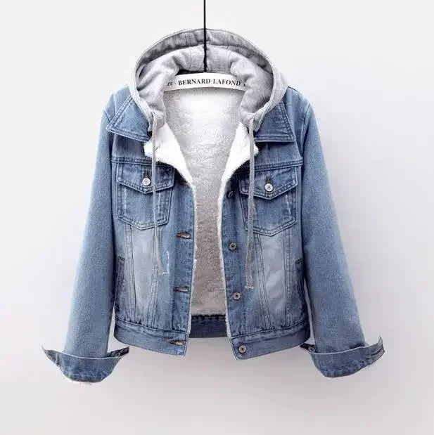 Blue denim jacket with a gray hoodie on a white background