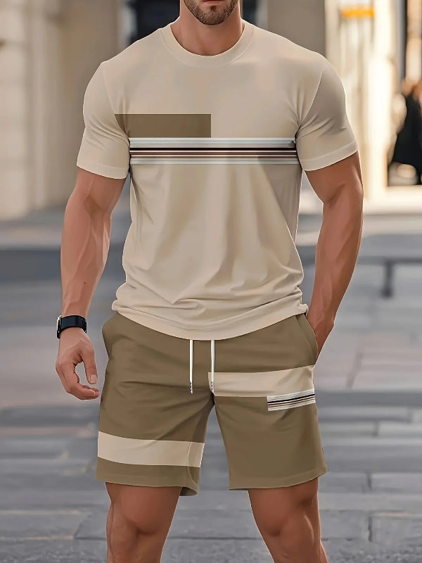 Man wearing a beige t-shirt and shorts with horizontal stripes on a blurred street background
