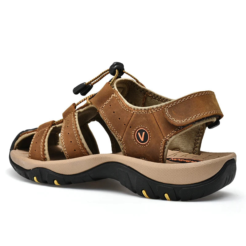 Brown sandal with black sole on a white background