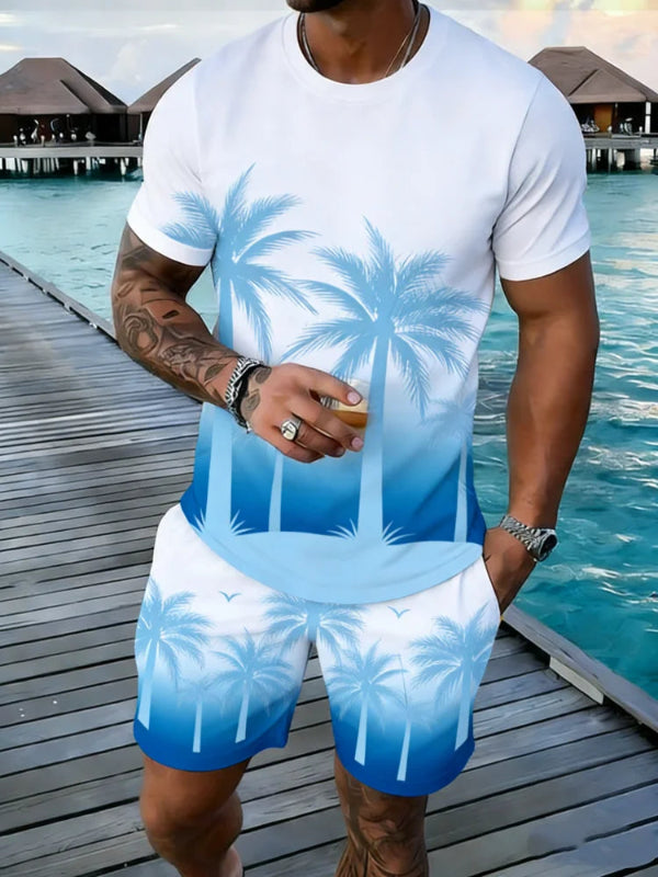 Man wearing a white and blue palm tree patterned outfit by a waterfront.