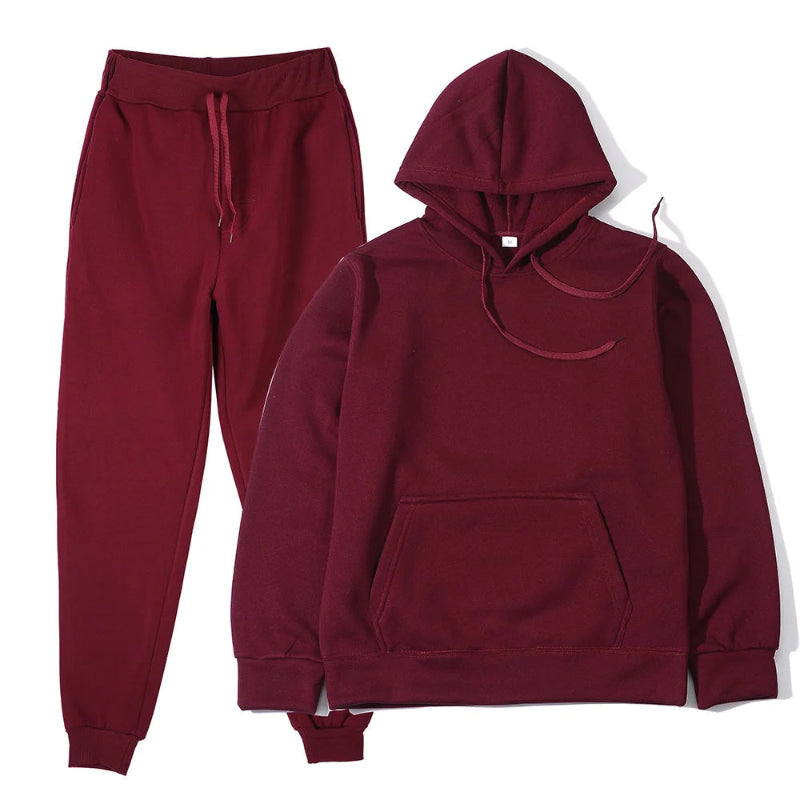 Maroon hoodie and jogger pants set on a white background