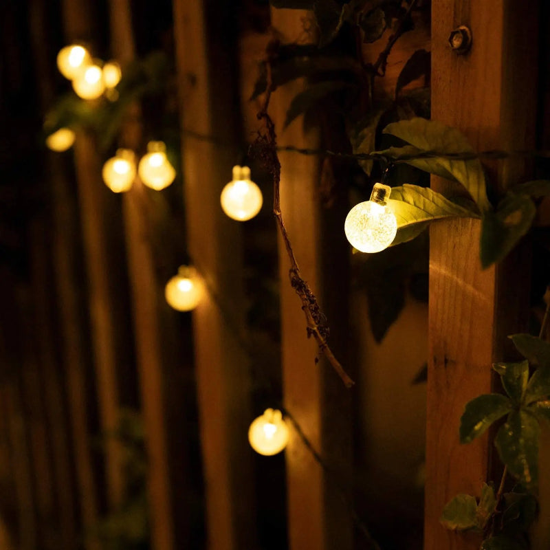 200 LED waterproof solar crystal globe string lights for outdoor garden, patio, or Christmas decoration.  warm