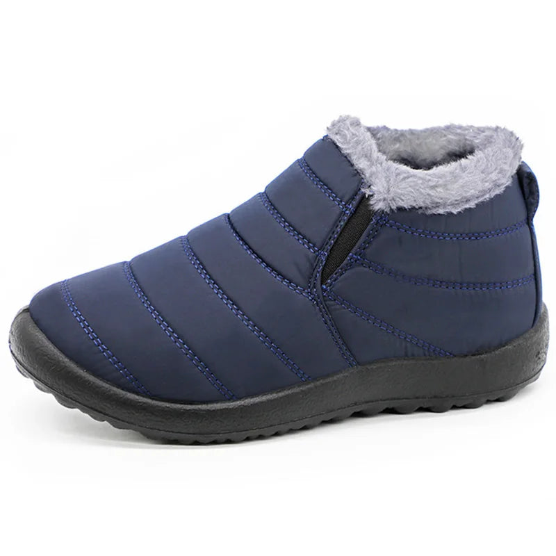 Blue winter boot with gray fur lining on a white background