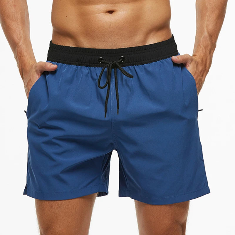 Escatch men’s quick dry swim trunks with zipper pockets and mesh lining in stylish beachwear design blue black