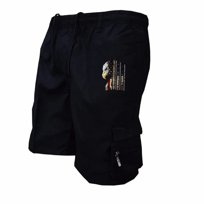 Black shorts with an eagle emblem on a white background