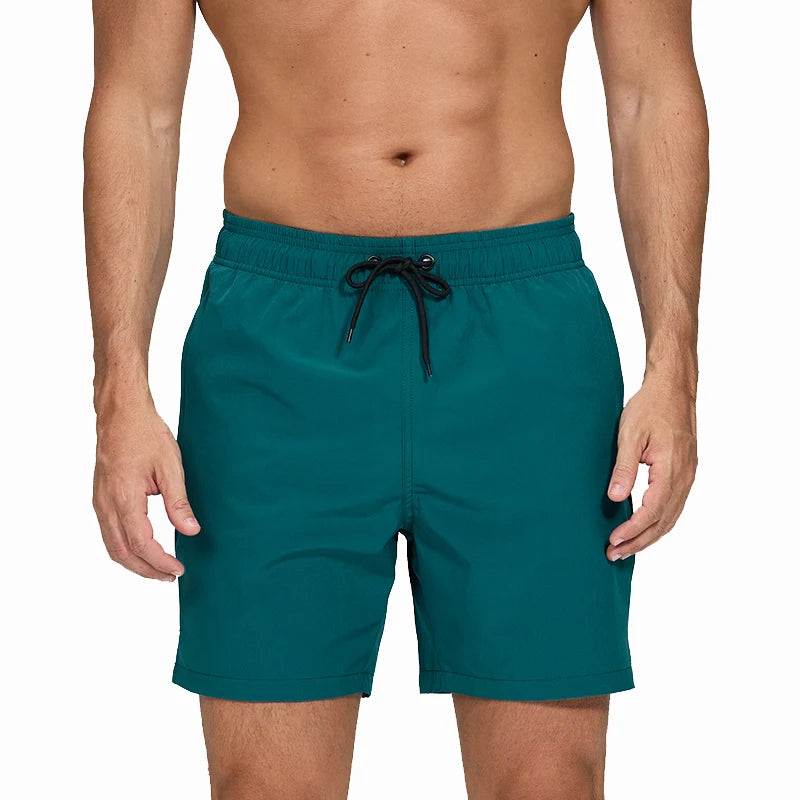 Escatch men’s quick dry swim trunks with zipper pockets and mesh lining in stylish beachwear design green