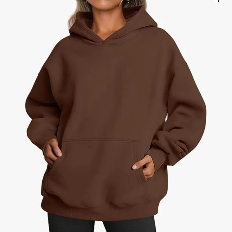 Brown hoodie worn by a person on a white background