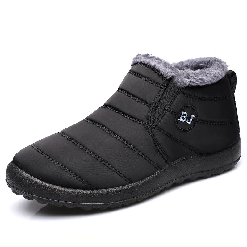 Black winter boot with gray fur lining on a white background
