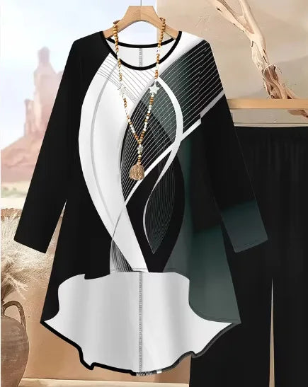 Black and white dress with geometric design on a hanger