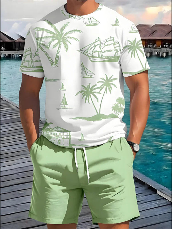 Person wearing a white t-shirt with green island-themed design and green shorts by a waterfront.