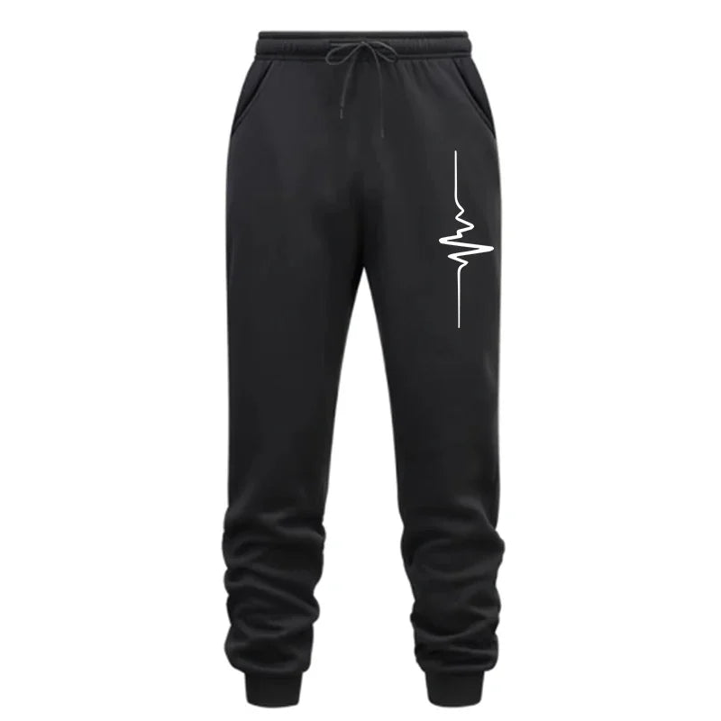 Black sweatpants with a white graphic design on a white background