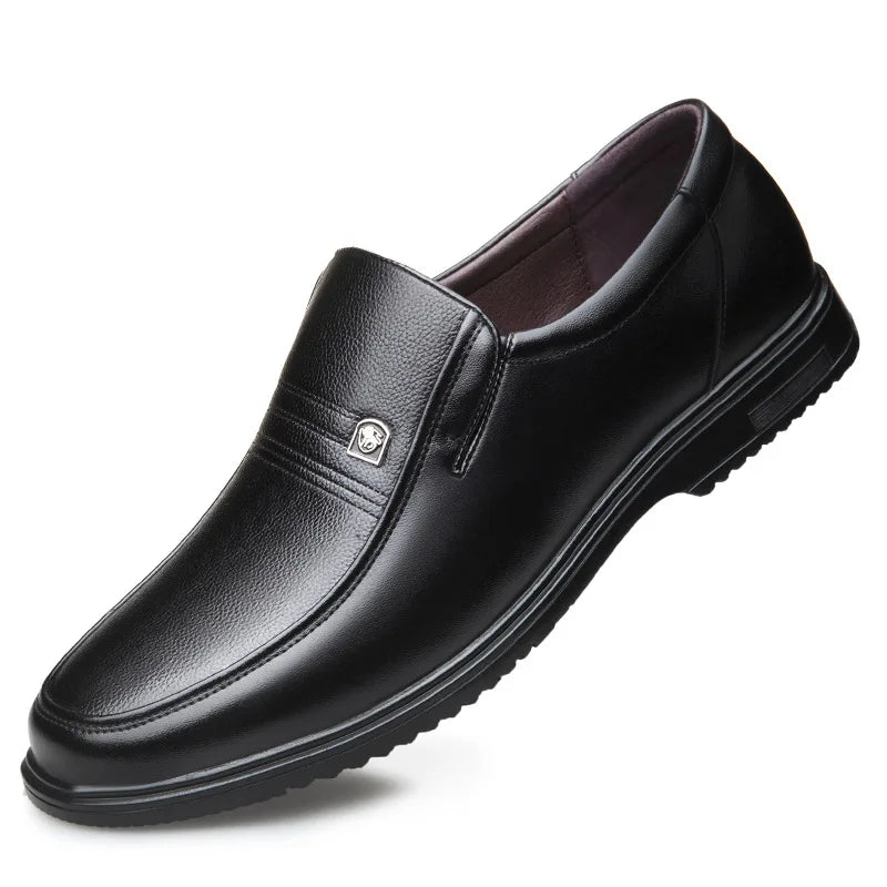 Black leather shoe on a white background