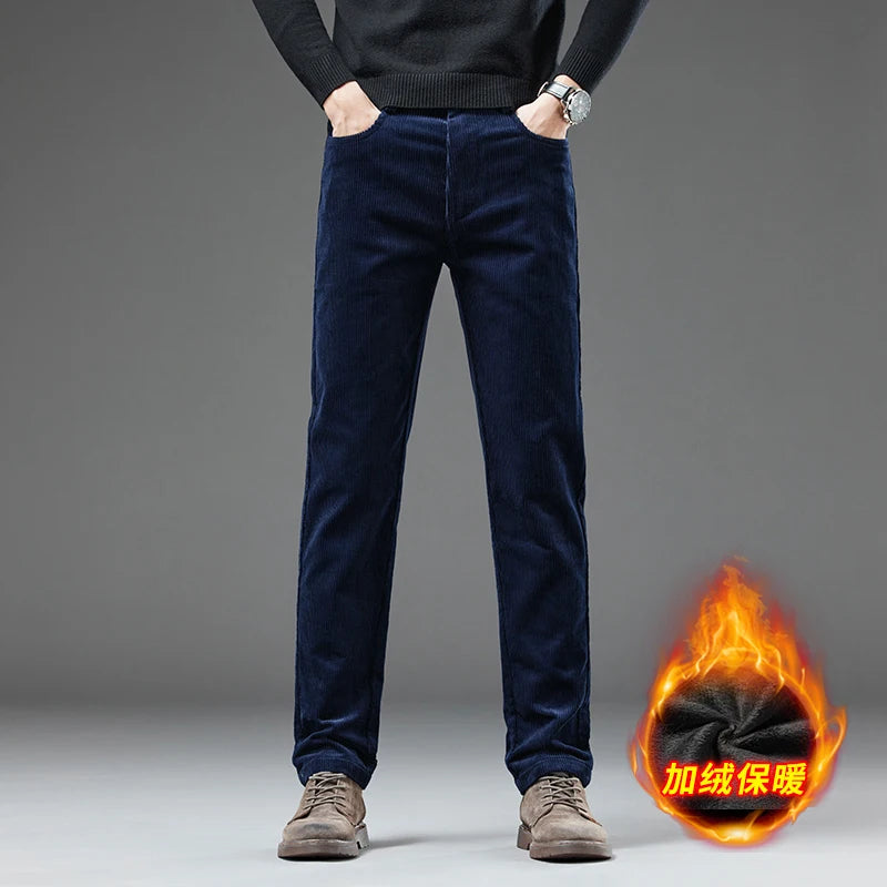 Person wearing dark blue pants with a fiery graphic and text on a gray background