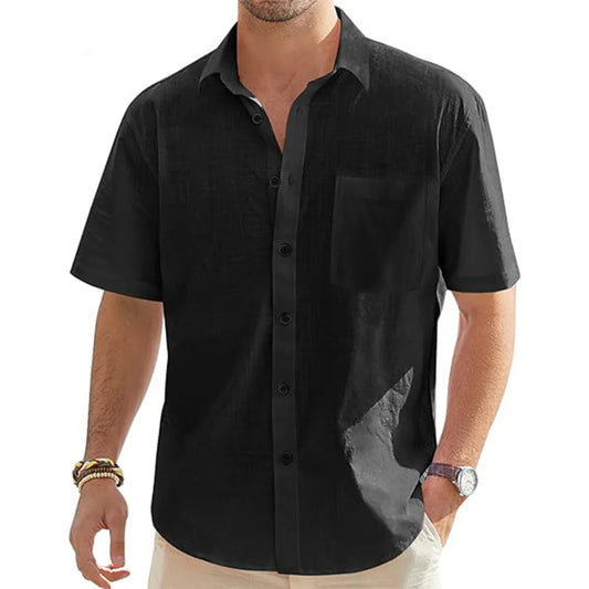 Black short-sleeve shirt worn by a person on a white background