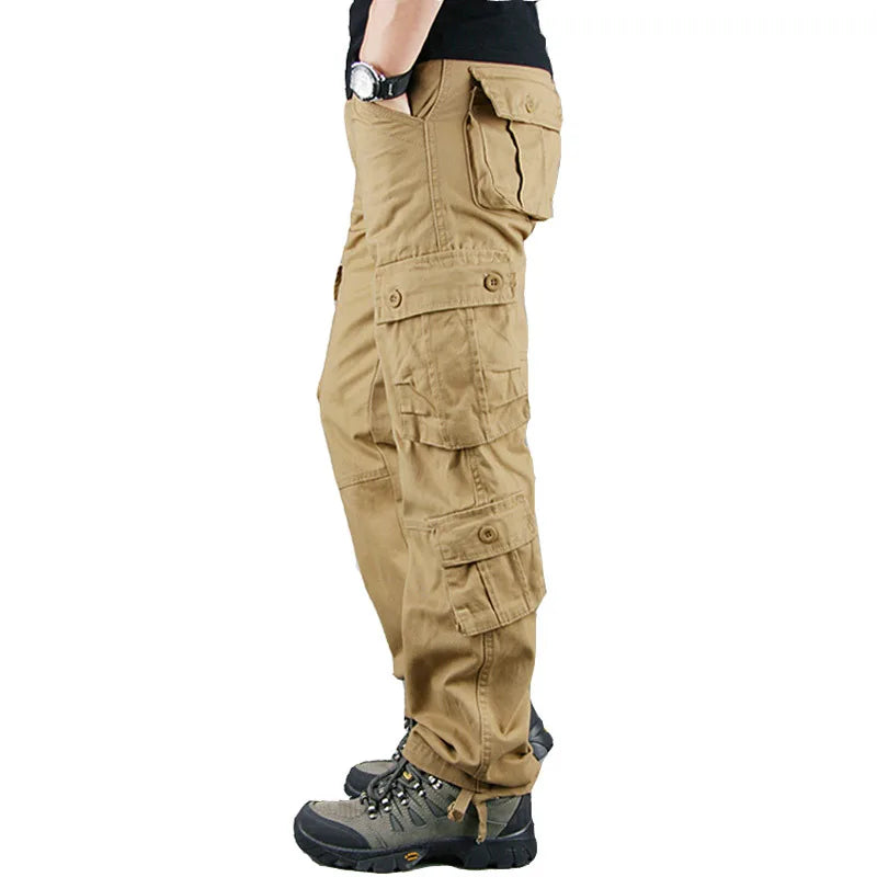 Tan cargo pants worn by a person on a white background