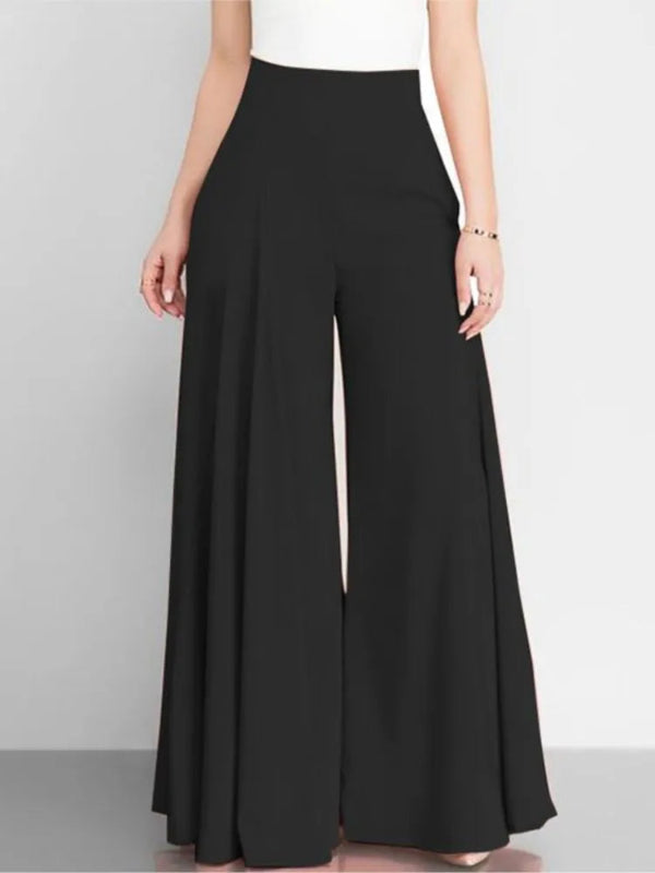 Black wide-leg pants worn by a person on a gray background