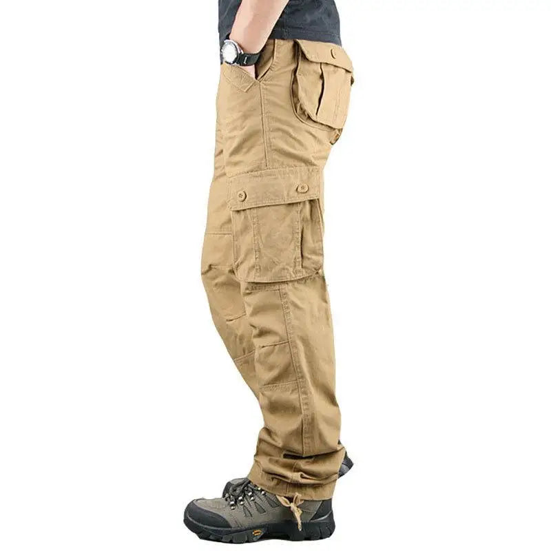 Tan cargo pants worn by a person on a white background