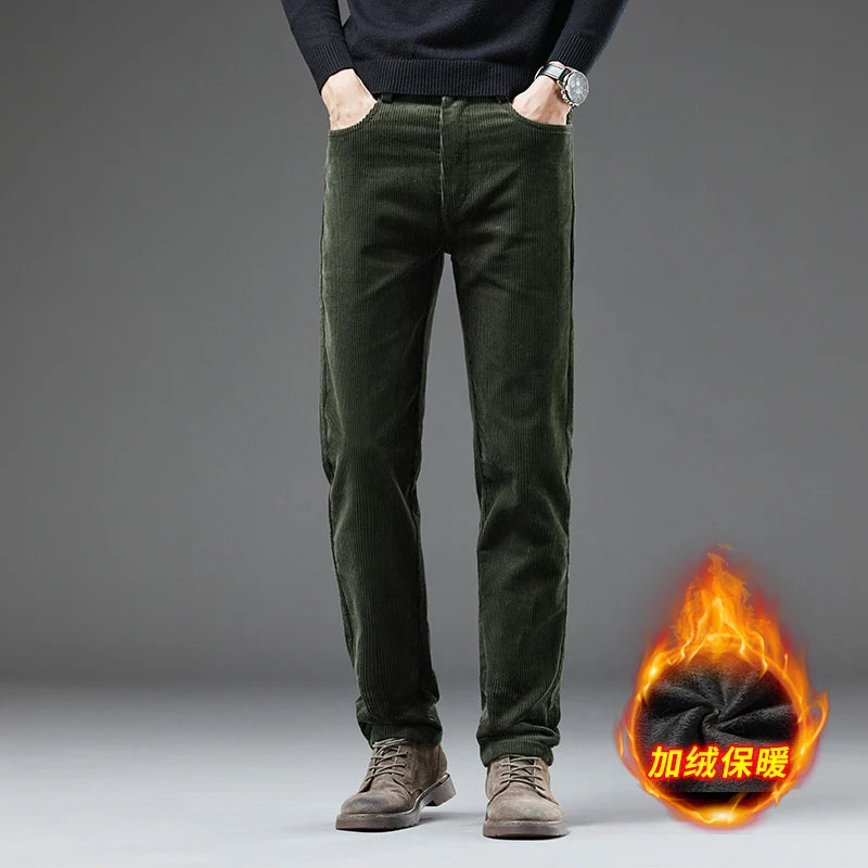 Person wearing dark green pants with a fiery graphic and text on a gray background