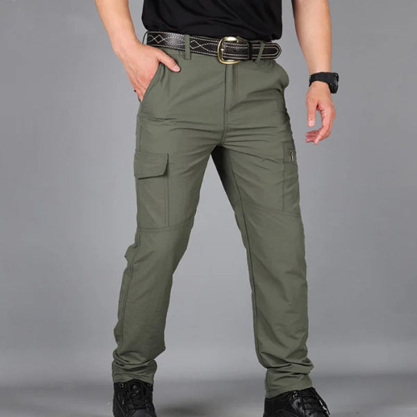 Men’s summer cargo pants in streetwear style, designed for trekking, hiking, and outdoor work with multiple pockets and breathable fabric -  green