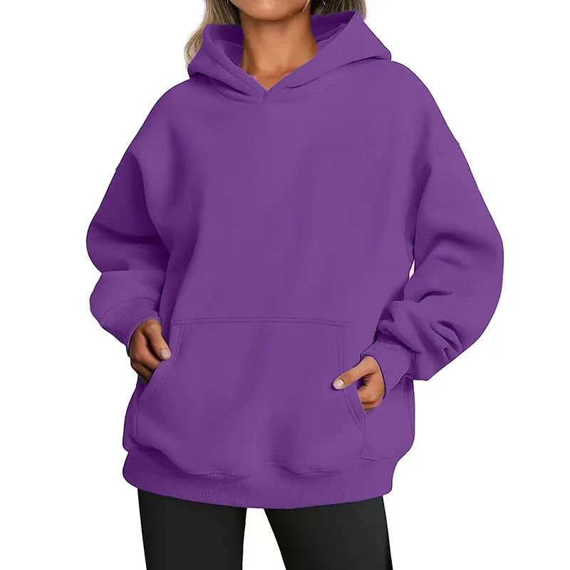 Purple hoodie worn by a person on a white background