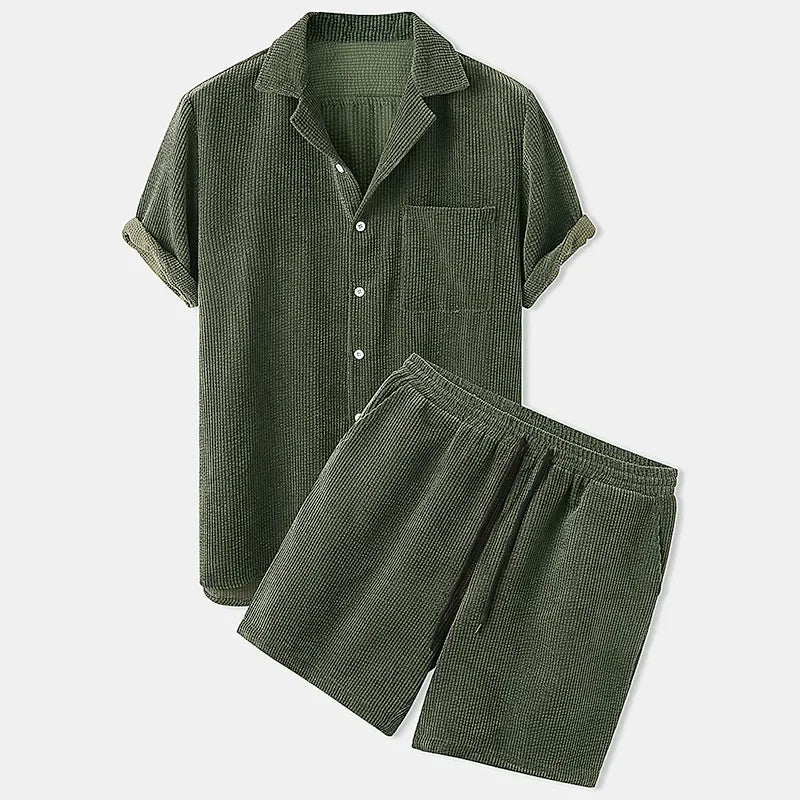 Green waffle-textured shirt and shorts set on a white background