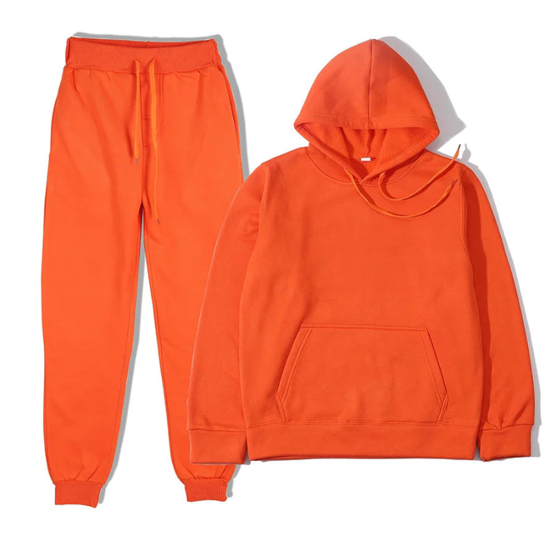 Orange hoodie and sweatpants set on a white background