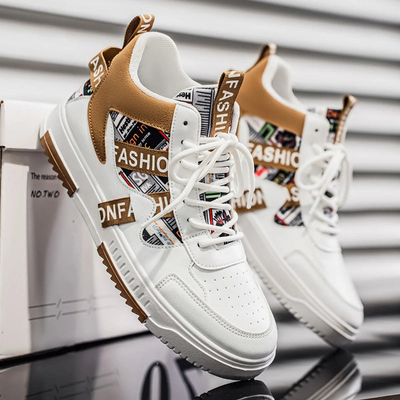 White sneakers with brown accents and 'Fashion' text on a metallic surface