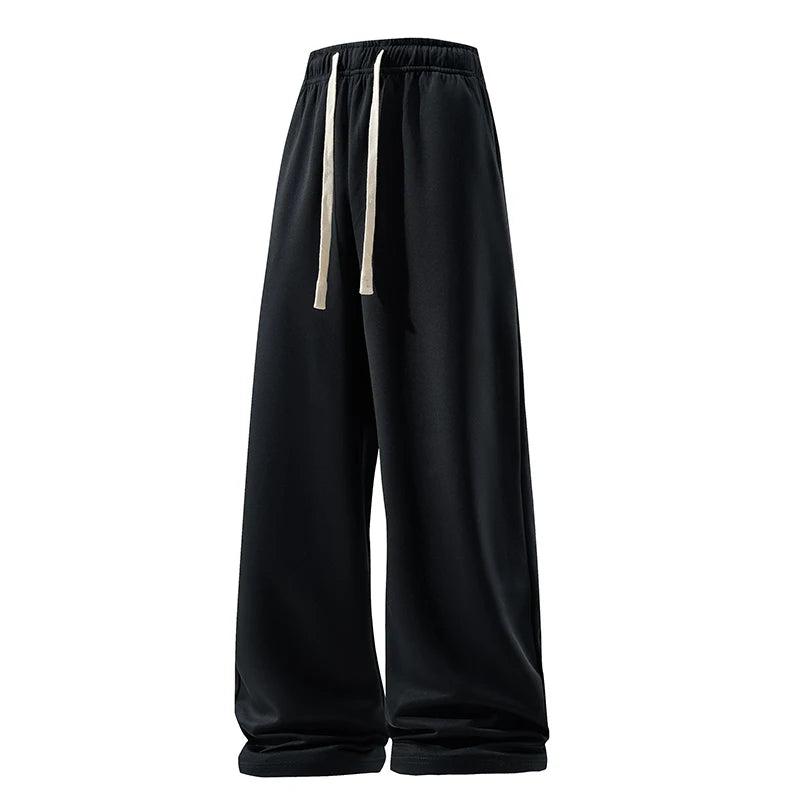 Black wide-leg pants with drawstring on a white background