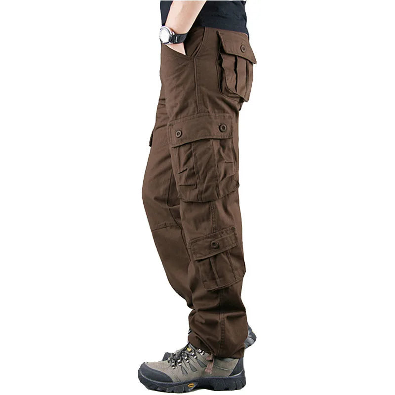 Brown cargo pants worn by a person on a white background 08