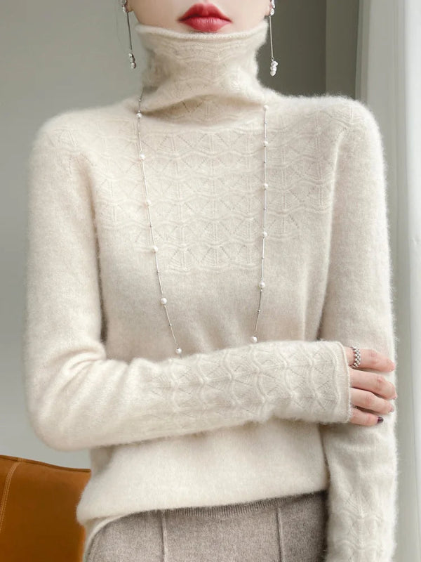 Beige turtleneck sweater worn by a person with a neutral background