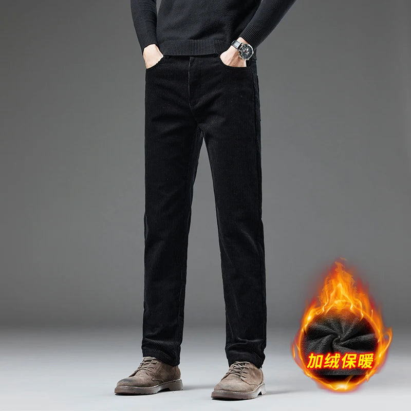Person wearing black pants with a fiery graphic and text on a gray background