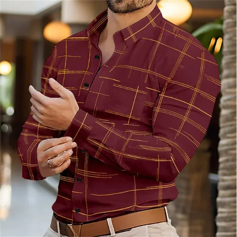 Man wearing a burgundy plaid shirt with a blurred background