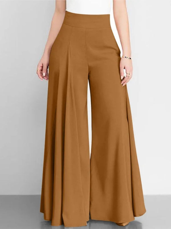 Brown wide-leg pants worn by a person on a gray background