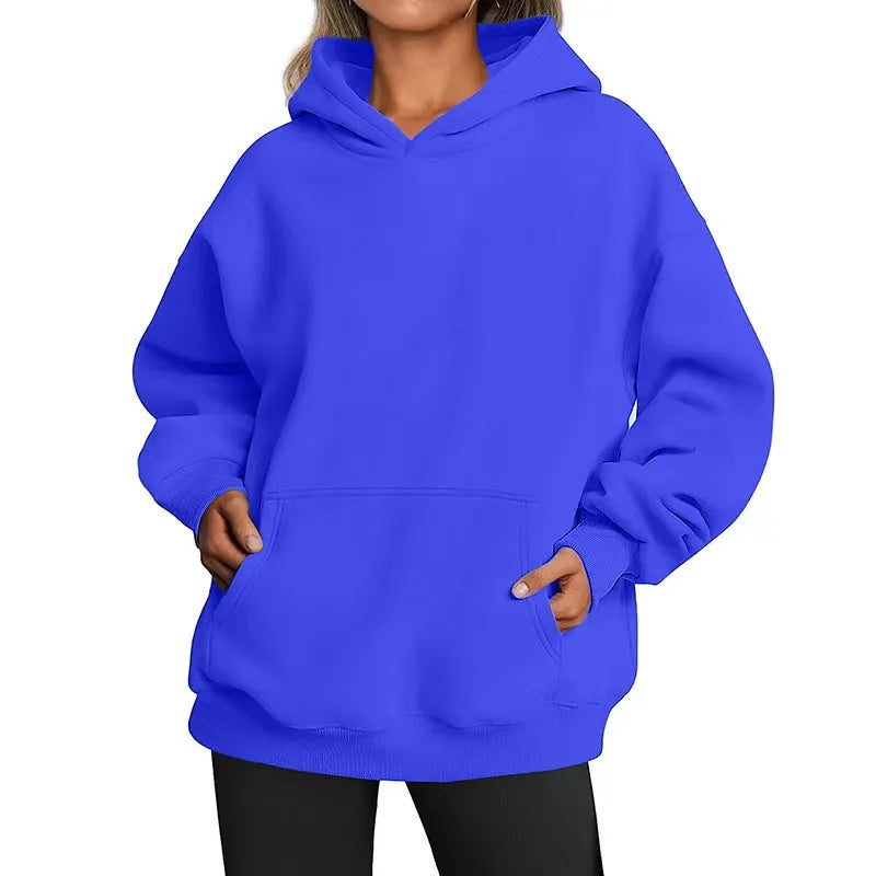 Blue hoodie worn by a person on a white background