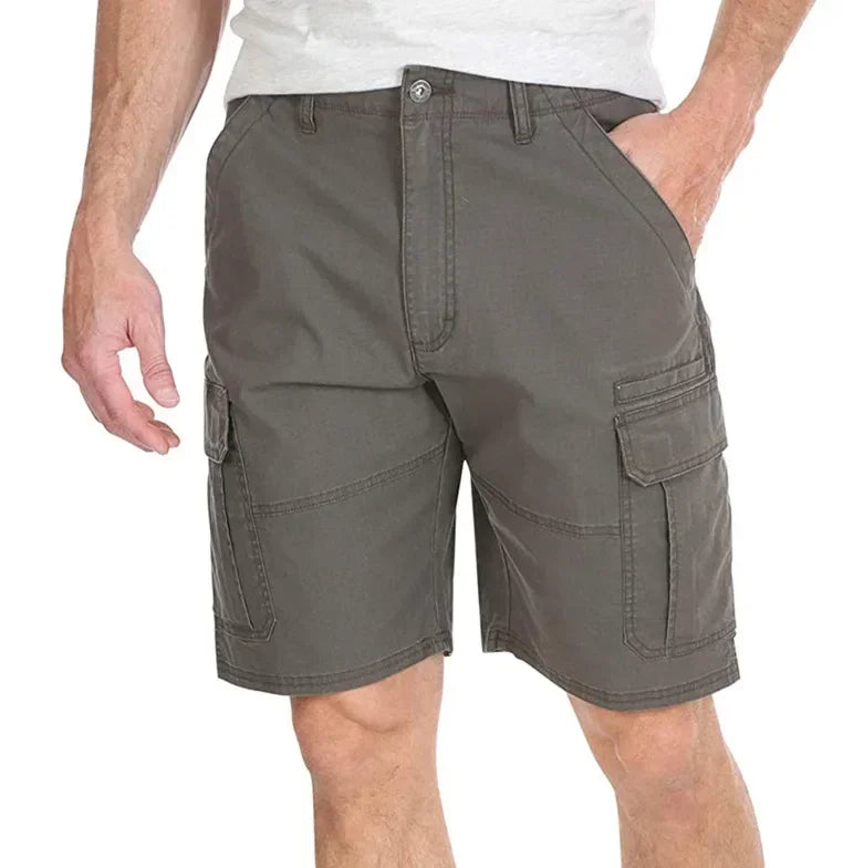 Gray cargo shorts worn by a person on a white background