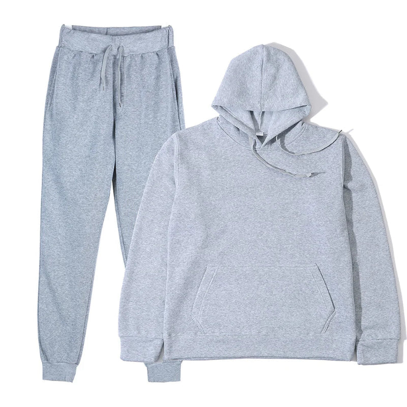 Gray hoodie and pants set on a white background