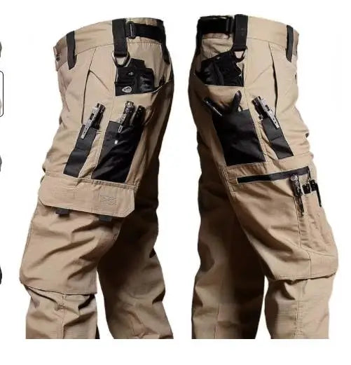 Tan tactical pants with multiple pockets and attachments on a white background